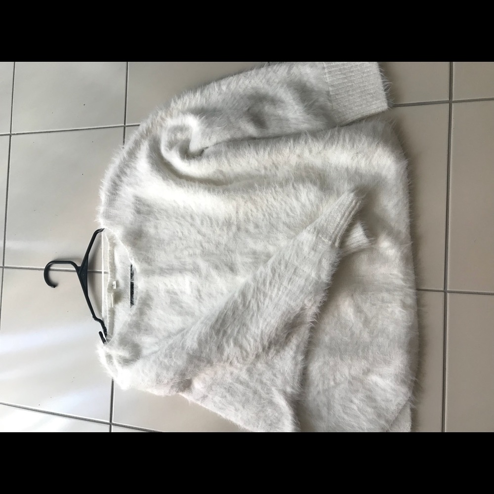 White fuzzy sweater